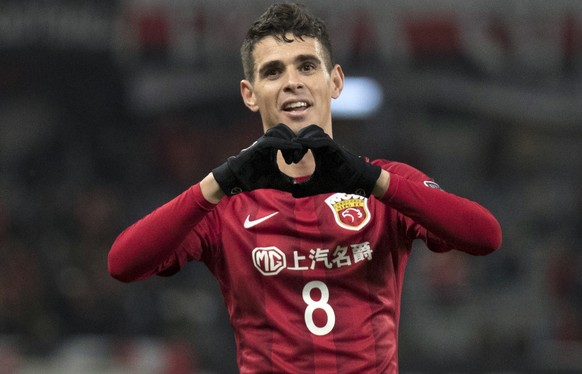 In this Feb. 28, 2017 photo, Brazilian player Oscar of Shanghai SIPG makes a gesture during an Asian Champions League group-stage match against Western Sydney Wanderers in Shanghai, China. For a secon ...