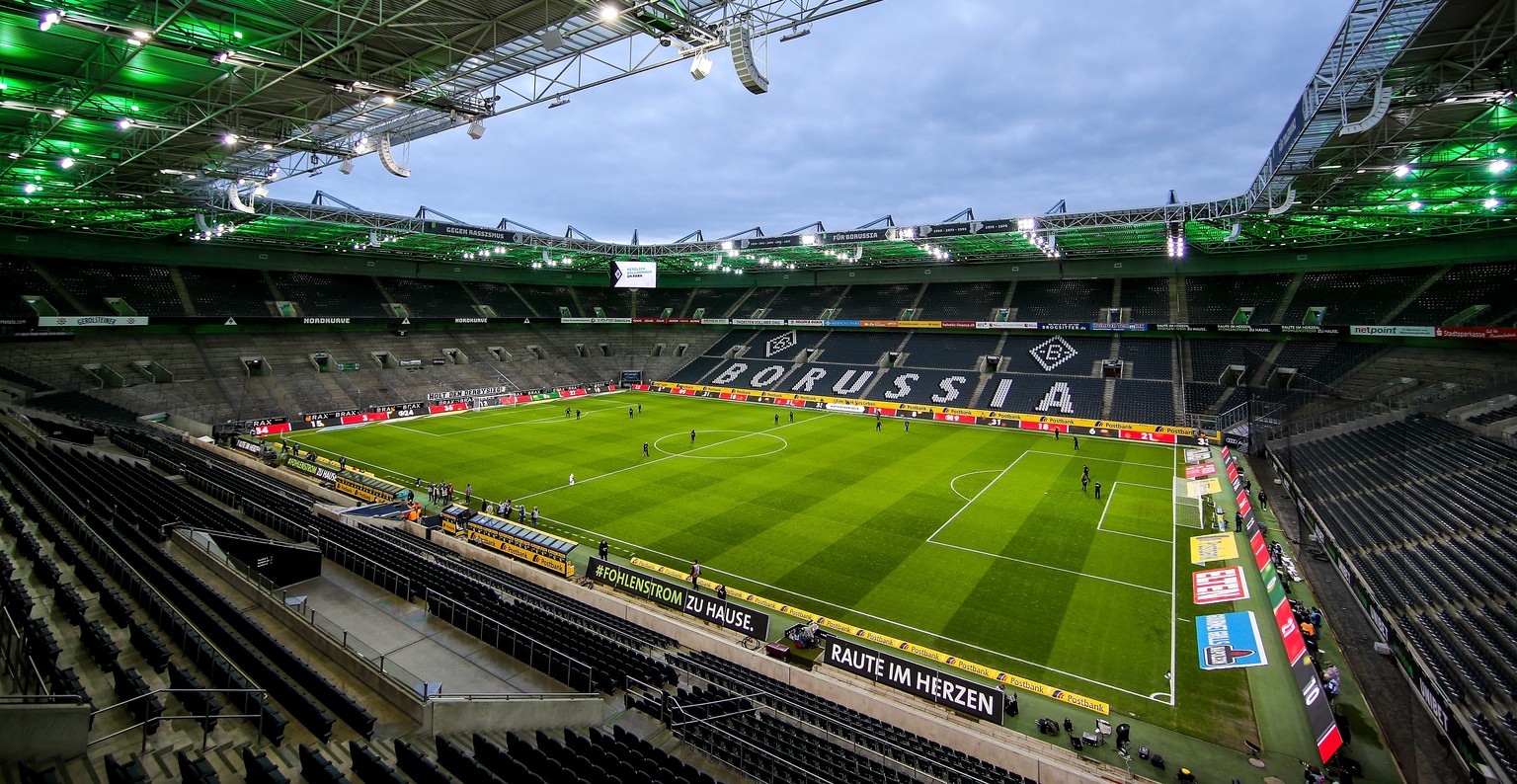 epa08286773 View of empty stands prior to the German Bundesliga soccer match between Borussia Moenchengladbach and 1. FC Koeln in Moenchengladbach, Germany, 11 March 2020. he match takes place behind  ...