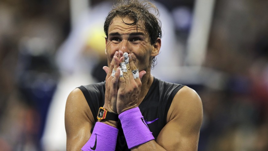 Rafael Nadal, of Spain, reacts after defeating Daniil Medvedev, of Russia, to win the men&#039;s singles final of the U.S. Open tennis championships Sunday, Sept. 8, 2019, in New York. (AP Photo/Charl ...