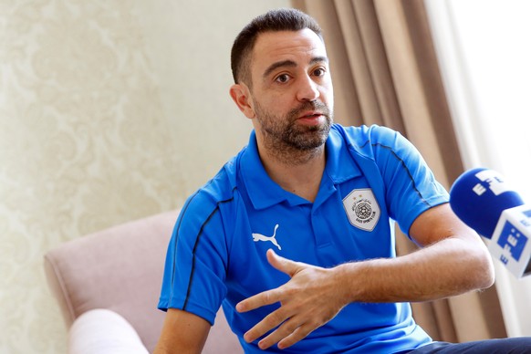 epa07608070 (FILE) - Former FC Barcelona legend and Al Sadd SC player Xavi Hernandez of Spain speaks during an interview in a hotel in Tehran, Iran, 20 May 2019 (re-issued 28 May 2019). Xavi Hernandez ...