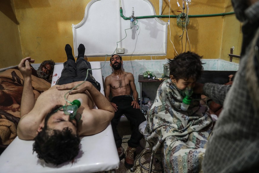 epa07382555 (FILE) - Affected people receive treatment after a gas attack on al-Shifunieh village, in Eastern Ghouta, Syria, 25 February 2018 (reissued 20 February 2019). Mohammed Badra, Syrian staff  ...
