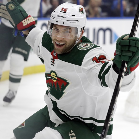 Minnesota Wild left wing Jason Zucker celebrates his goal against the Tampa Bay Lightning during the first period of an NHL hockey game Thursday, Dec. 5, 2019, in Tampa, Fla. (AP Photo/Chris O&#039;Me ...
