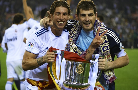 VALENCIA, BARCELONA - APRIL 20: Iker Casillas (R) and Sergio Ramos of Real Madrid celebrate after the Copa del Rey final match between Real Madrid and Barcelona at Estadio Mestalla on April 20, 2011 i ...
