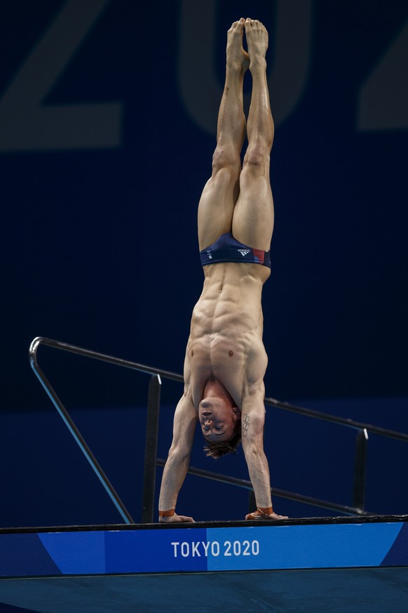 epa09357816 Tom Daley of Great Britain during a training session prior to the start of the Diving competition held at the Aquatics Center during the Tokyo 2020 Olympic Games in Tokyo, Japan, 22 July 2 ...