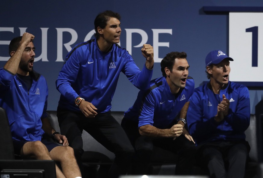 Europe&#039;s Marin Cilic, left, Rafael Nadal, 2nd left, Roger Federer, 2nd right, and Tomas Berdych, right, celebrate a point during the Laver Cup tennis match between Europe&#039;s Dominic Thiem and ...