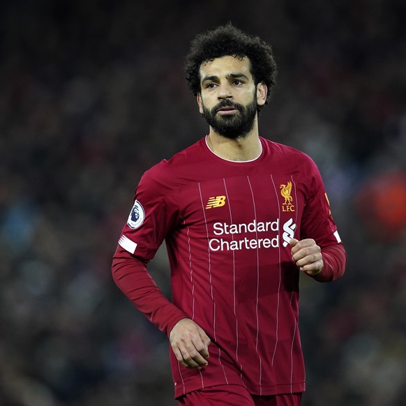 Liverpool&#039;s Mohamed Salah runs during the English Premier League soccer match between Liverpool and Sheffield United at Anfield Stadium, Liverpool, England, Thursday, Jan. 2, 2020. (AP Photo/Jon  ...