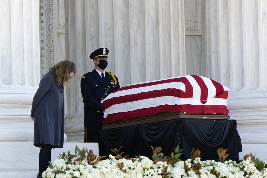 The flag-draped casket of Justice Ruth Bader Ginsburg lies in repose under the Portico at the top of the front steps of the U.S. Supreme Court building on Wednesday, Sept. 23, 2020, in Washington. Gin ...