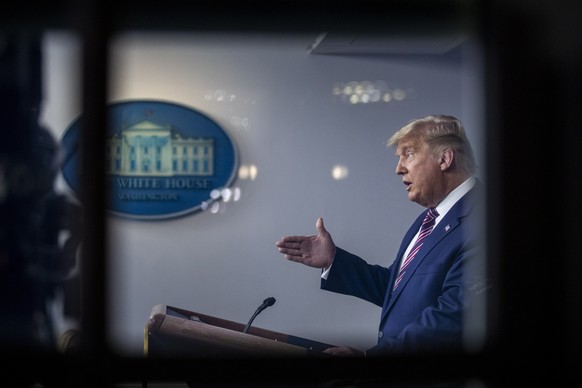 epa08801977 US President Donald J. Trump delivers remarks from the White House press briefing room at the White House in Washington, DC, USA, 05 November 2020. The 2020 Presidential Election result re ...
