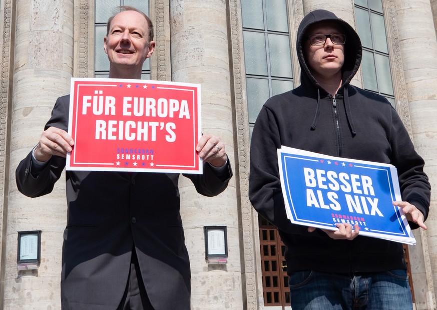 epa07523231 MEP and &#039;The Party&#039; party leader Martin Sonneborn (L), and satirist Nico Semsrott (R) pose during the EU election campaign opening of the German satirical party Die PARTEI (The P ...