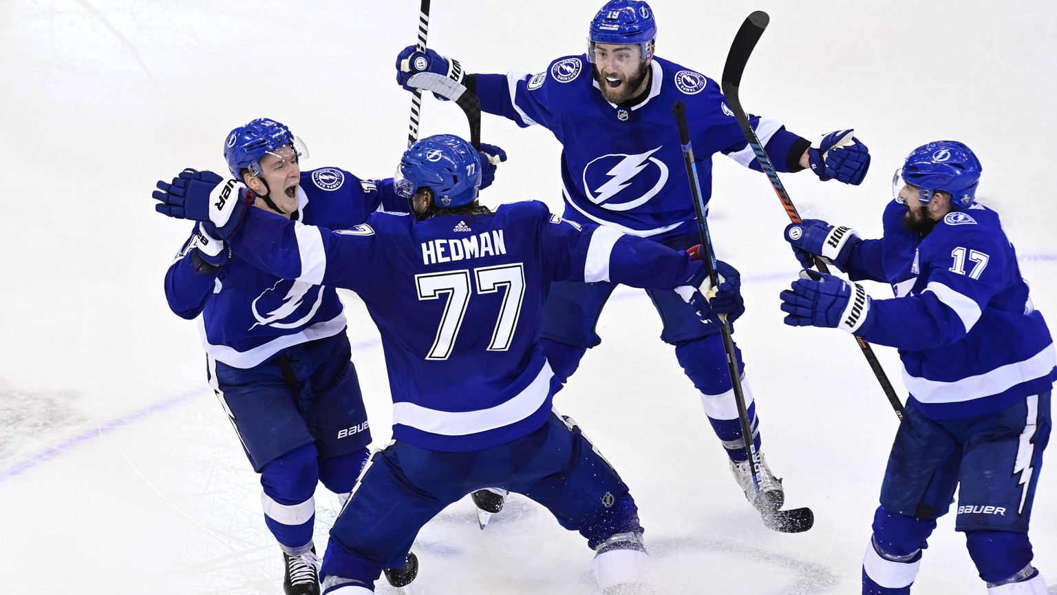 Tampa Bay Lightning defenseman Victor Hedman (77) celebrates his winning goal against the Boston Bruins with teammates Ondrej Palat (18), Patrick Maroon (14) and Alex Killorn (17) during the second ov ...