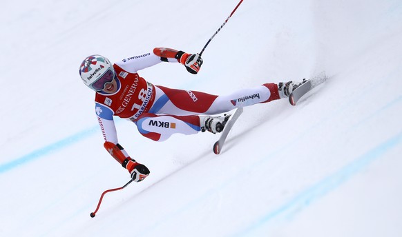 Switzerland&#039;s Michelle Gisin speeds down the course of an alpine ski, women&#039;s World Cup super-G race in Garmisch-Partenkirchen, Germany, Monday, Feb. 1, 2021. (AP Photo/Marco Trovati)