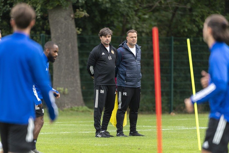 FC Basel&#039;s head coach Ciriaco Sforza, left, and assistant coach Patrick Rahmen, right, during a training session the day before the UEFA Europa League third qualifying round soccer match between  ...