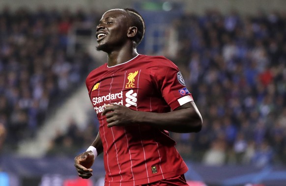 epa07944342 Sadio Mane of Liverpool celebrates after scoring during the UEFA Champions League Group E match between Genk and Liverpool FC in Genk, Belgium, 23 October 2019. EPA/STEPHANIE LECOCQ