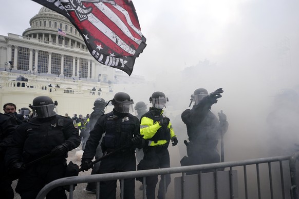 Police hold off Trump supporters who tried to break through a police barrier, Wednesday, Jan. 6, 2021, at the Capitol in Washington. As Congress prepares to affirm President-elect Joe Biden&#039;s vic ...