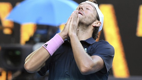 France&#039;s Lucas Pouille celebrates after defeating Canada&#039;s Milos Raonic in their quarterfinal match at the Australian Open tennis championships in Melbourne, Australia, Wednesday, Jan. 23, 2 ...