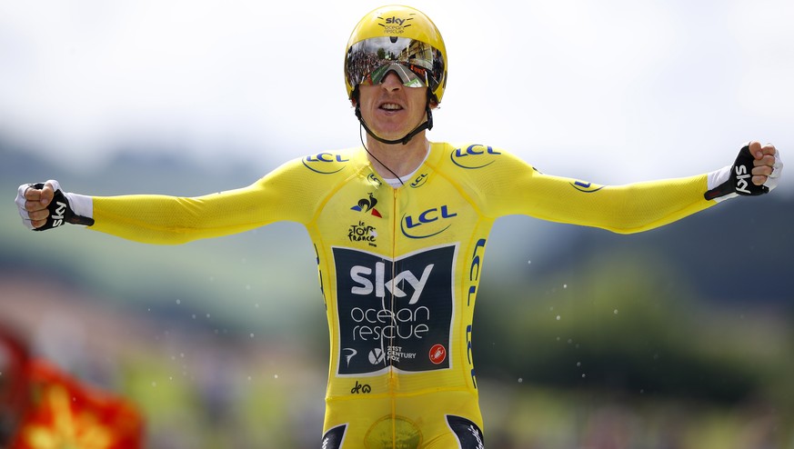 epa06916151 Team Sky rider Geraint Thomas of Britain reacts as he crosses the finish line of the 20th stage of the 105th edition of the Tour de France cycling race, an individual time trial over 31km  ...