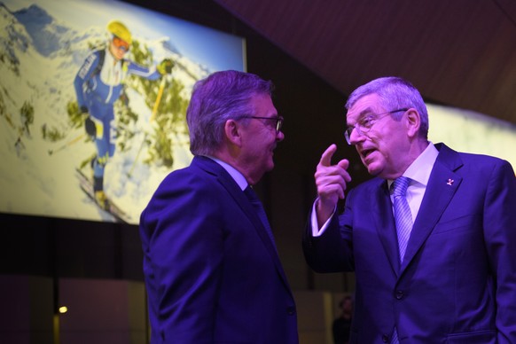 epa08116132 International Olympic Committee (IOC) President Thomas Bach (R) from Germany speaks with President of the International Ice Hockey Federation (IIHF) Rene Fasel (L) before the the 135th Ses ...
