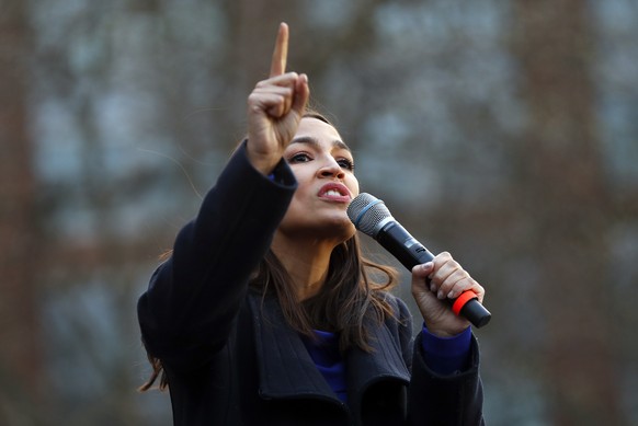 U.S. Rep. Alexandria Ocasio-Cortez , D-N.Y., speaks at a campaign rally for Democratic presidential candidate U.S. Sen. Bernie Sanders, I-Vt., at the University of Michigan in Ann Arbor, Mich., Sunday ...