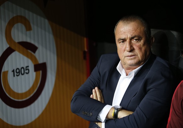 FILE- In this Tuesday, Oct. 1, 2019 file photo, Galatasaray&#039;s manager Fatih Terim, sits on the bench prior to a Champions League Group A soccer match between Galatasaray and PSG in Istanbul. Teri ...