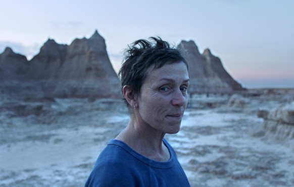 This image released by Searchlight Pictures shows Frances McDormand in a scene from the film &quot;Nomadland.&quot; (Searchlight Pictures via AP)