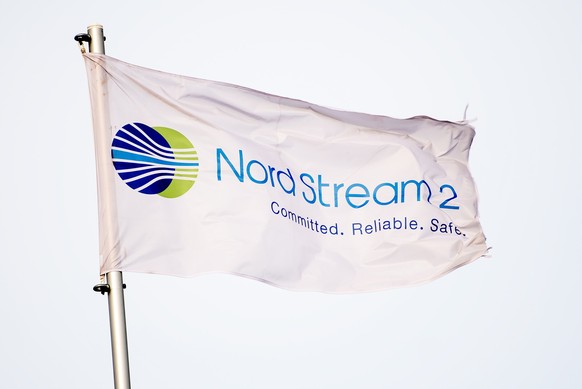 epa08645995 (FILE) - A flag reading &#039;Nord Stream 2&#039; on the construction site of the Nord Stream 2 in Lubmin, Germany, 26 March 2019 (reissued 04 September 2020). Opposition parties have call ...