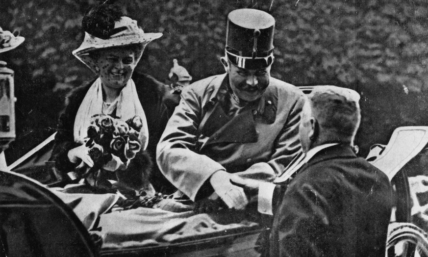 Franz Ferdinand, archduke of Austria, and his wife Sophie riding in an open carriage at Sarajevo shortly before their assassination. (Photo by Henry Guttmann Collection/Hulton Archive/Getty Images)