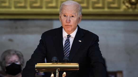 epa09133674 US President Joe Biden speaks during the service for U.S. Capitol Officer William ?Billy? Evans, as his remains lie in honor in the Capitol Rotunda in Washington, DC, USA, on 13 April 2021 ...