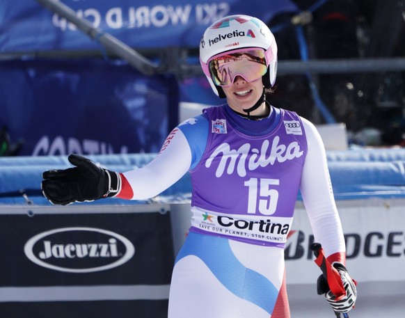 Switzerland&#039;s Michelle Gisin reacts at the finish area of an alpine ski, women&#039;s World Cup downhill in Cortina D&#039;Ampezzo, Italy, Saturday, Jan. 19, 2019. (AP Photo/Giovanni Auletta)