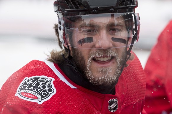 Ice forms on the beard of Ottawa Senators left wing Mike Hoffman during practice on the outdoor rink ahead of the NHL 100 Classic hockey match in Ottawa, Friday, Dec. 15, 2017. The Montreal Canadiens  ...