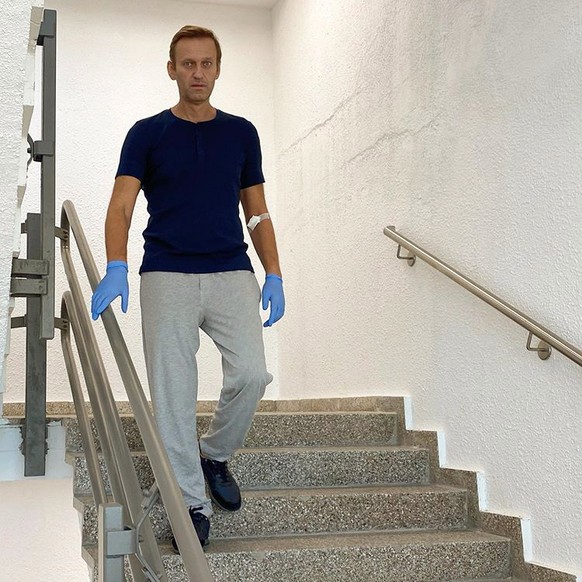epa08689803 An undated, recent handout photo made available by Russian opposition leader Alexei Navalny via his Instagram site shows Navalny on the stairs at the Charite hospital in Berlin, Germany (r ...