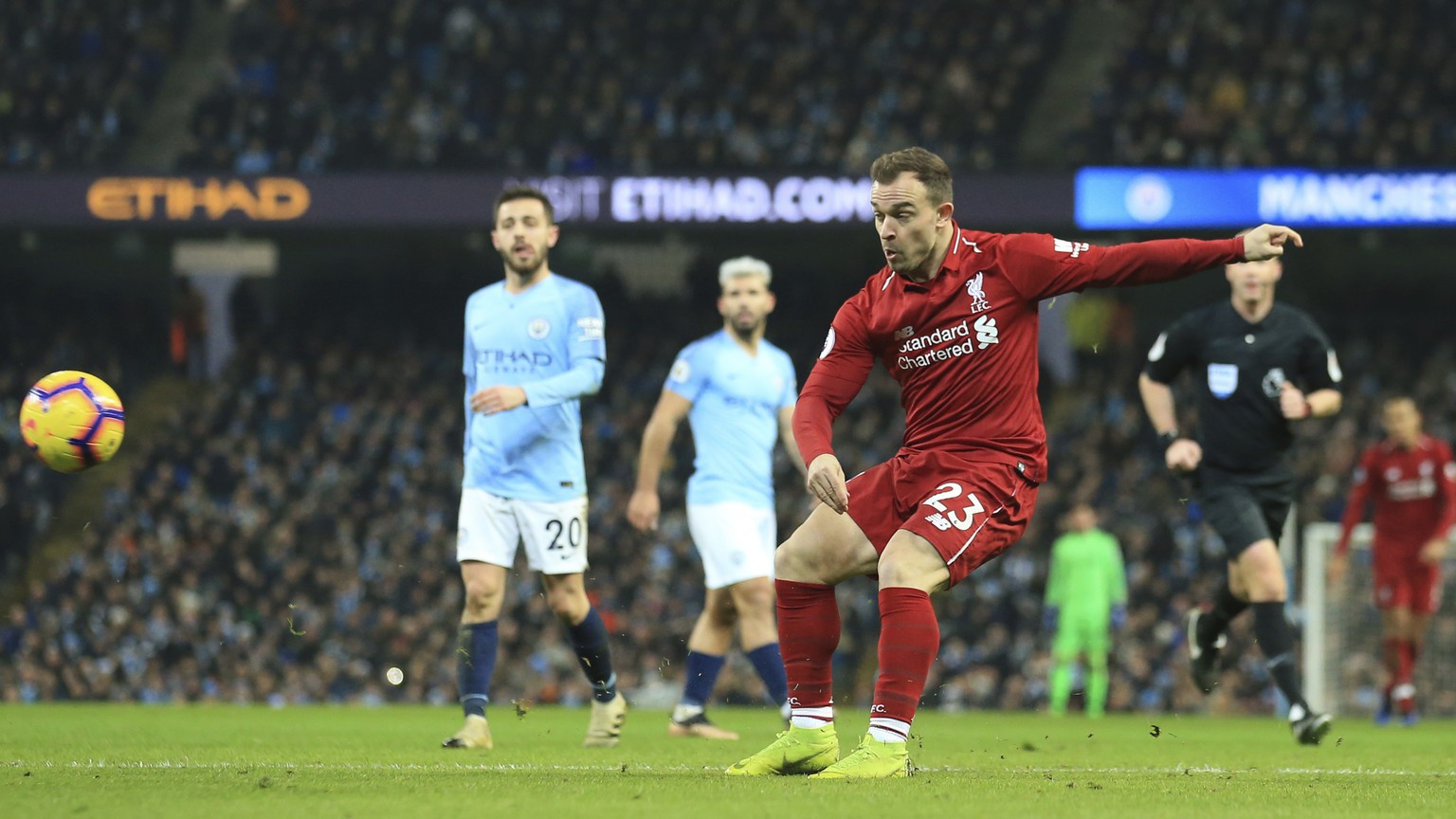 Liverpool&#039;s Xherdan Shaqiri shots at goal during their English Premier League soccer match between Manchester City and Liverpool at the Ethiad stadium, Manchester England, Thursday, Jan. 3, 2019. ...
