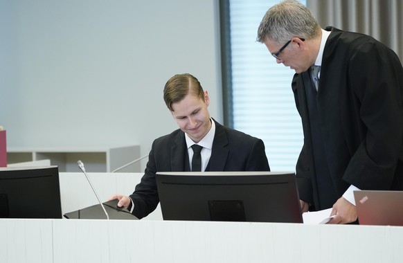 epa08433608 Norwegian suspect Philip Manshaus (L) and his defender Audun Beckstrom at the trial on terrorism and murder charges in the Asker and Baerum district court in Sandvika, west of Oslo, Norway ...