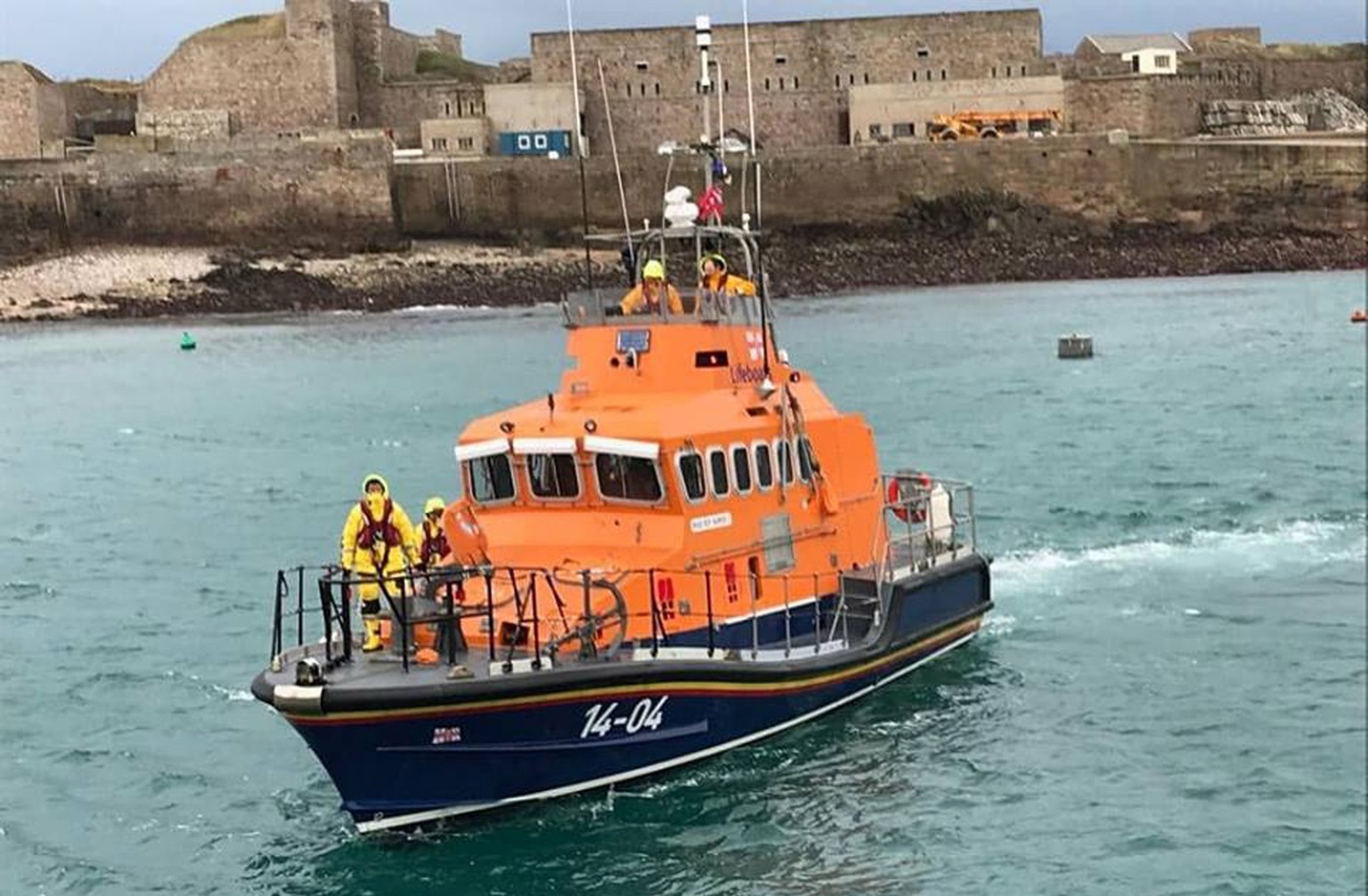 epa07309612 A handout photo made available by Royal National Lifeboat Institution (RNLI) showing the Alderney Lifeboat on 22 Janaury 2019 returning to the island for a crew change before resuming the  ...