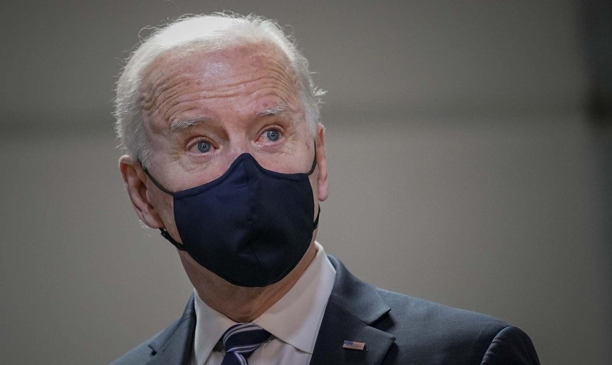 President Joe Biden looks on during his visit to Smith Flooring, Inc., Tuesday March 16, 2021, in Chester, Pa. President Biden says New York Gov. Andrew Cuomo should resign if the state attorney gener ...