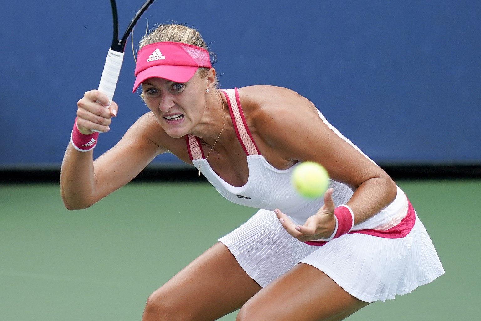 Kristina Mladenovic, of France, returns a shot to Varvara Gracheva, of Russia, during the second round of the US Open tennis championships, Wednesday, Sept. 2, 2020, in New York. (AP Photo/Seth Wenig)