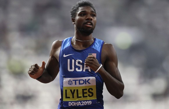 FILE - In this Sept. 29, 2019, file photo, Noah Lyles, of the United States looks at the scoreboard after a men&#039;s 200 meter heat at the World Athletics Championships in Doha, Qatar. Lyles is spen ...