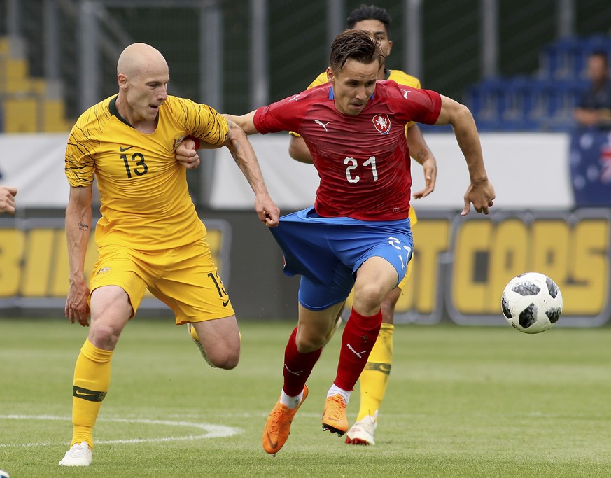 Australia&#039;s Aaron Mooy, left, and Czech&#039;s Josef Sural, right, challenge for the ball during a friendly soccer match between Australia and Czech Republic in St Poelten, Austria, Friday, June  ...
