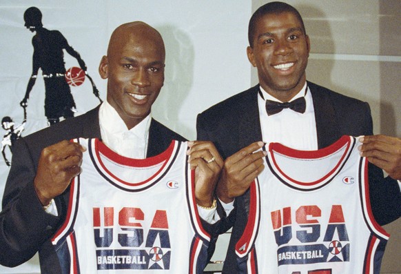 FILE - This Sept. 21, 1991 file photo shows Michael Jordan, left, and Earvin &quot;Magic&quot; Johnson holding their uniforms for the 1992 US Olympic Basketball team in Chicago. Cleveland Cavaliers st ...