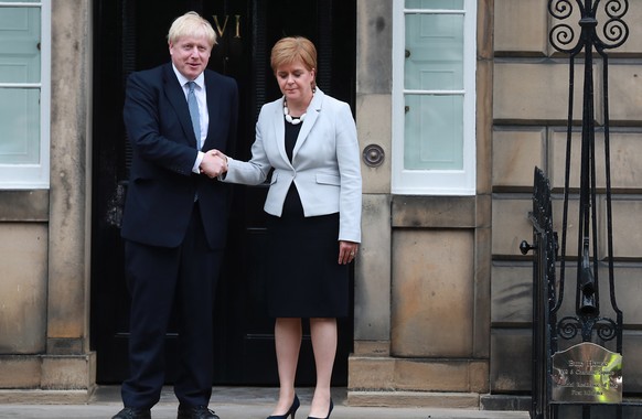 epaselect epa07747761 Prime Minister Boris Johnson (L) meets with Scotlands First Minister Nicola Sturgeon at Bute House, Edinburgh, Scotland, 29 July 2019. EPA/Stewart Attwood
