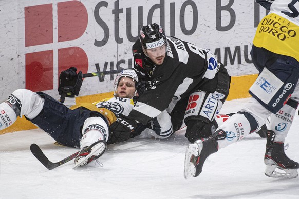 Lugano&#039;s player Mikkel Boedker, on top, during the preliminary round game of National League (NLA) Swiss Championship 2020/21 between HC Lugano against HC Ambri-Piotta at the ice stadium Corner A ...