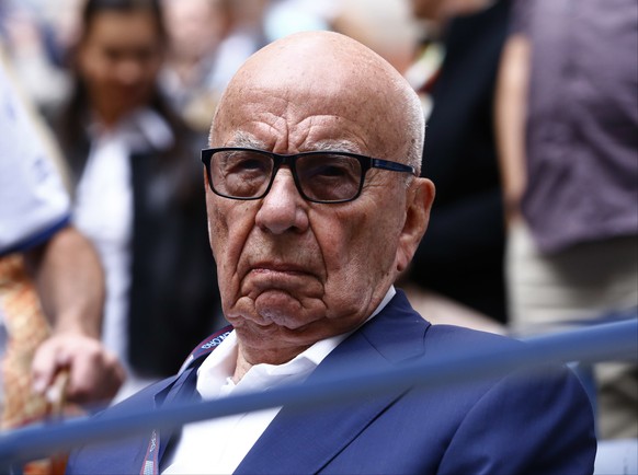 FILE- In this Sunday, Sept. 10, 2017 file photo, Rupert Murdoch waits for the start of the men&#039;s singles final of the U.S. Open tennis tournament in New York. Rupert Murdoch&#039;s British newspa ...