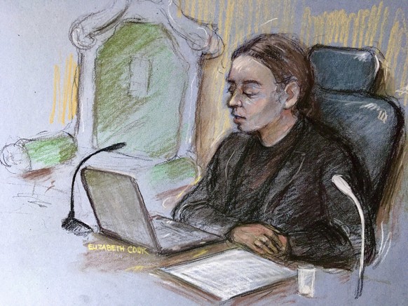 This is a court artist sketch by Elizabeth Cook, showing District Judge Vanessa Baraitser delivering her verdict in Julian Assange&#039;s extradition case at the Old Bailey court in London, Monday, Ja ...