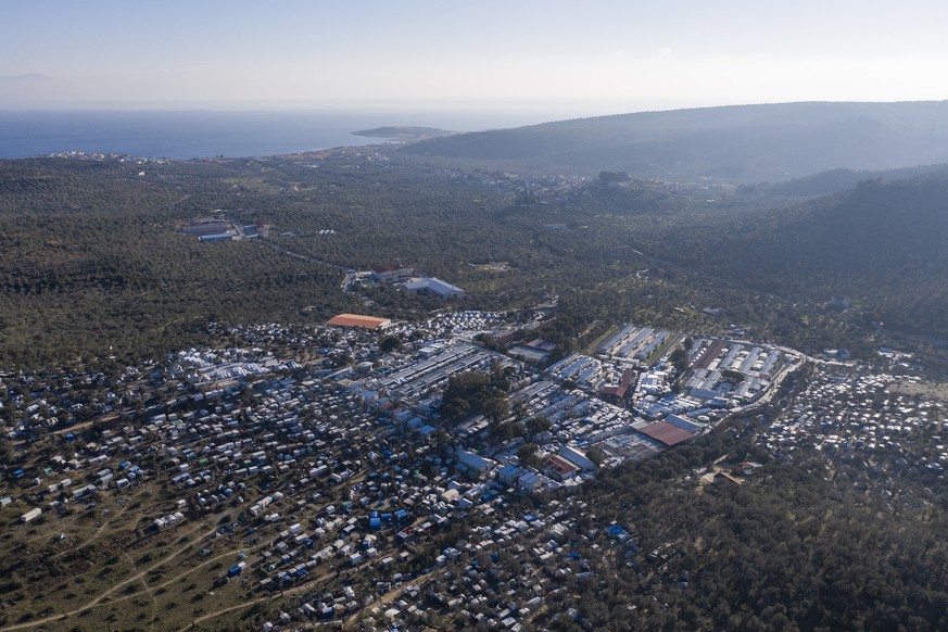 epa08150094 An image taken with a drone shows the refugee camp of Moria, on Lesvos island, Greece, 22 January 2020. At the camp, which is meant to host 2,500 migrants and refugees, nowdays are living  ...