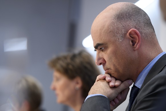 Swiss Federal councillor Alain Berset, right, next to Swiss Federal president Simonetta Sommaruga, left, brief the media about the latest measures to fight the Covid-19 Coronavirus pandemic, in Bern,  ...