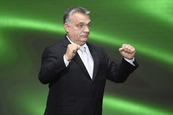 Prime Minister of Hungary Viktor Orban gestures after delivering his speech during an official celebration of the national holiday marking the 61st anniversary of the outbreak of the Hungarian revolut ...