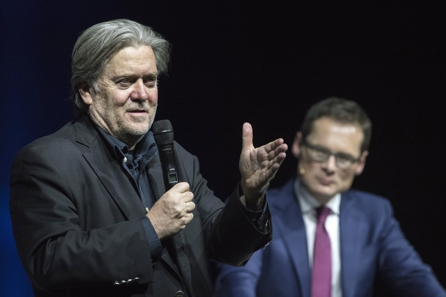 epa06585463 Former White House strategist Steve Bannon, (L0, speaks next to Editor-in-chief of Swiss weekly &#039;Weltwoche&#039; (World week), Roger Koeppel during the &#039;Weltwoche (World week) on ...