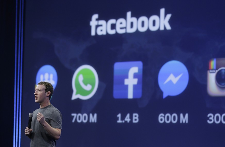 FILE - In this March 25, 2015 file photo CEO Mark Zuckerberg gives the keynote address during the Facebook F8 Developer Conference in San Francisco. Britain&#039;s competition watchdog The Competition ...