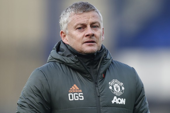 Manchester United&#039;s manager Ole Gunnar Solskjaer walks to the bench during the English Premier League soccer match between Everton and Manchester United at the Goodison Park stadium in Liverpool, ...
