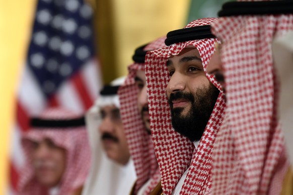 FILE - In this June 29, 2019 file photo, Saudi Arabia&#039;s Crown Prince Mohammed bin Salman listens during his meeting with President Donald Trump on the sidelines of the G-20 summit in Osaka, Japan ...