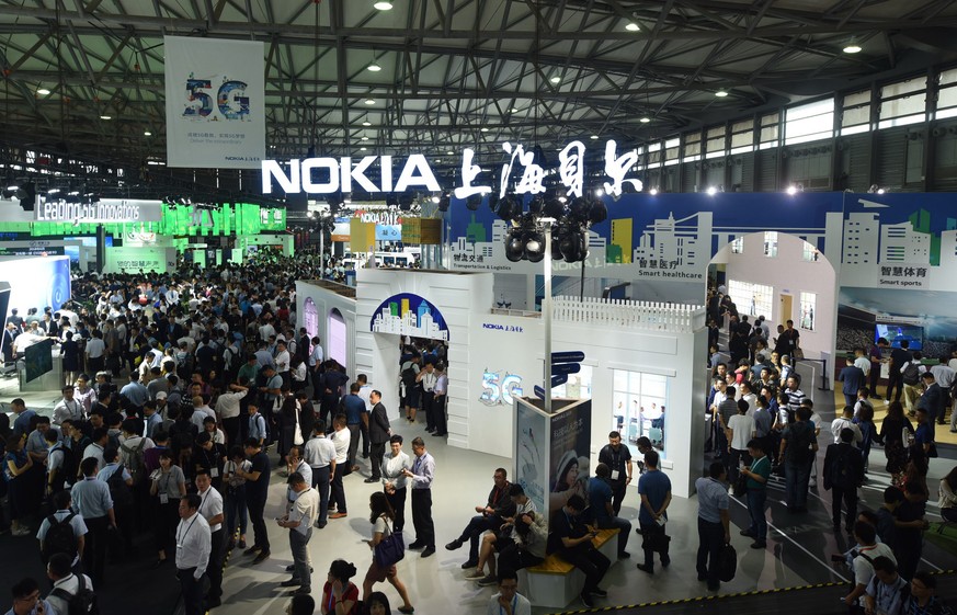 epa07676263 Visitors visit the Nokia booth at the 2019 Mobile World Congress (MWC) in Shainghai, China, 27 June 2019. The Mobile World Congress in Shanghai is one of China&#039;s largest forum for the ...